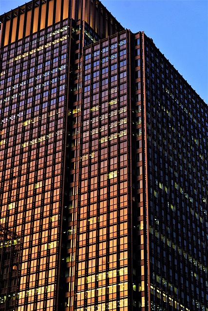 Skyscrapers in a bustling city at sunset, highlighting urban escapes.